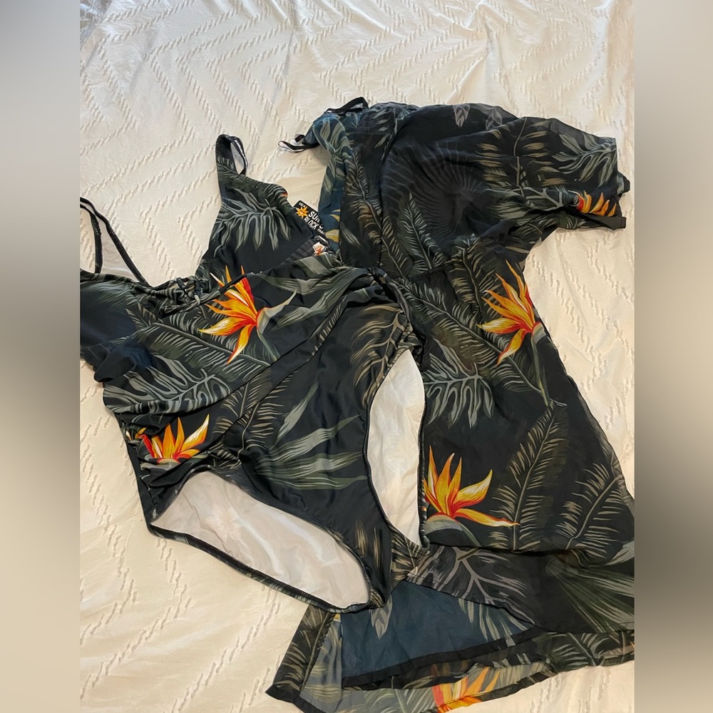 Landry’s swimsuit and coverup